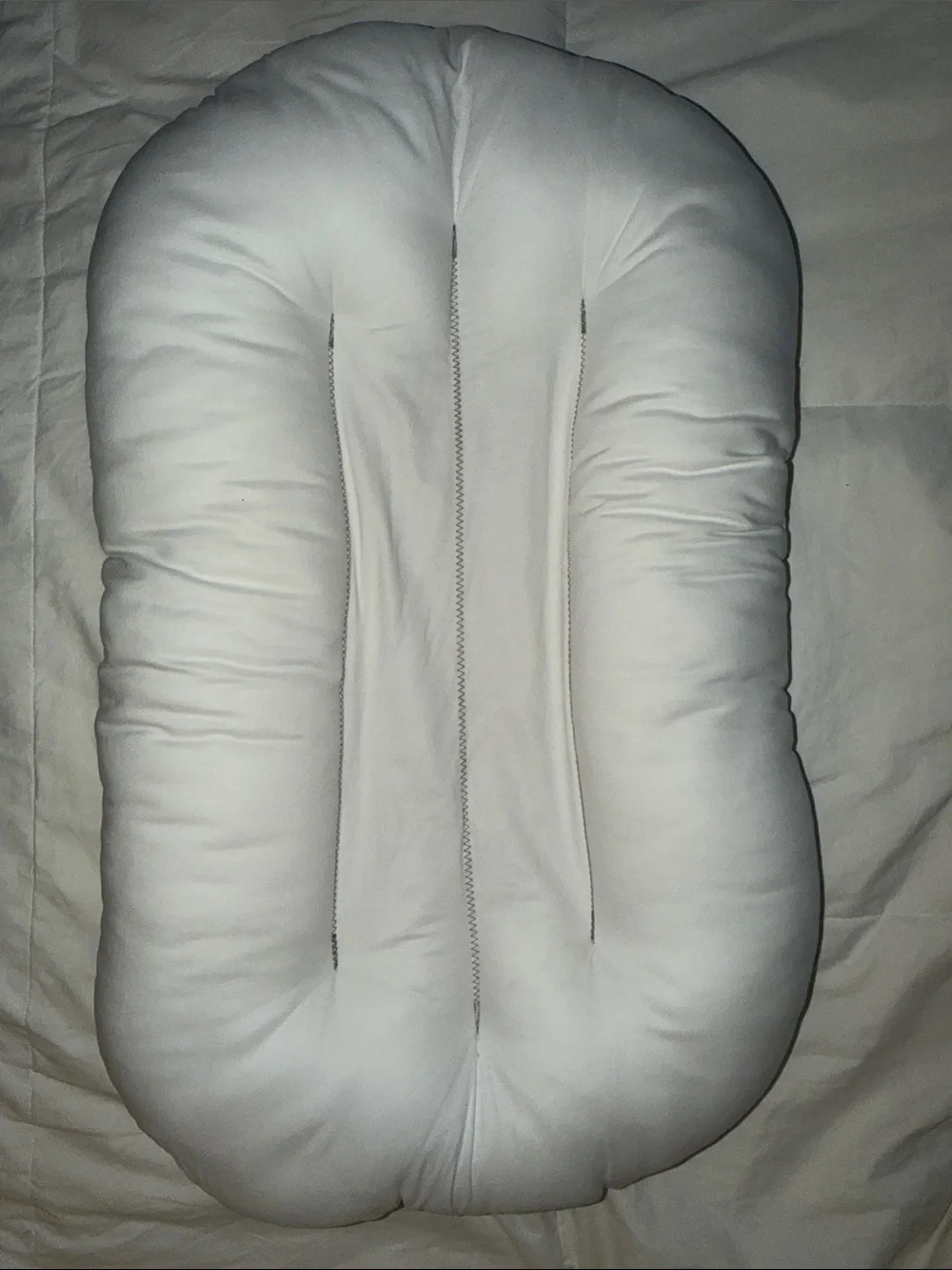 Snuggle Me patented sensory lounger pillow to hug your baby